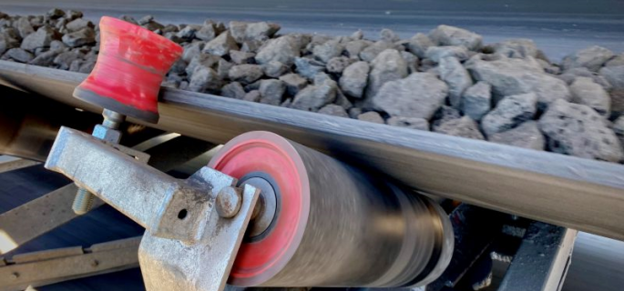 The Role of Conveyor Side Guide Rollers